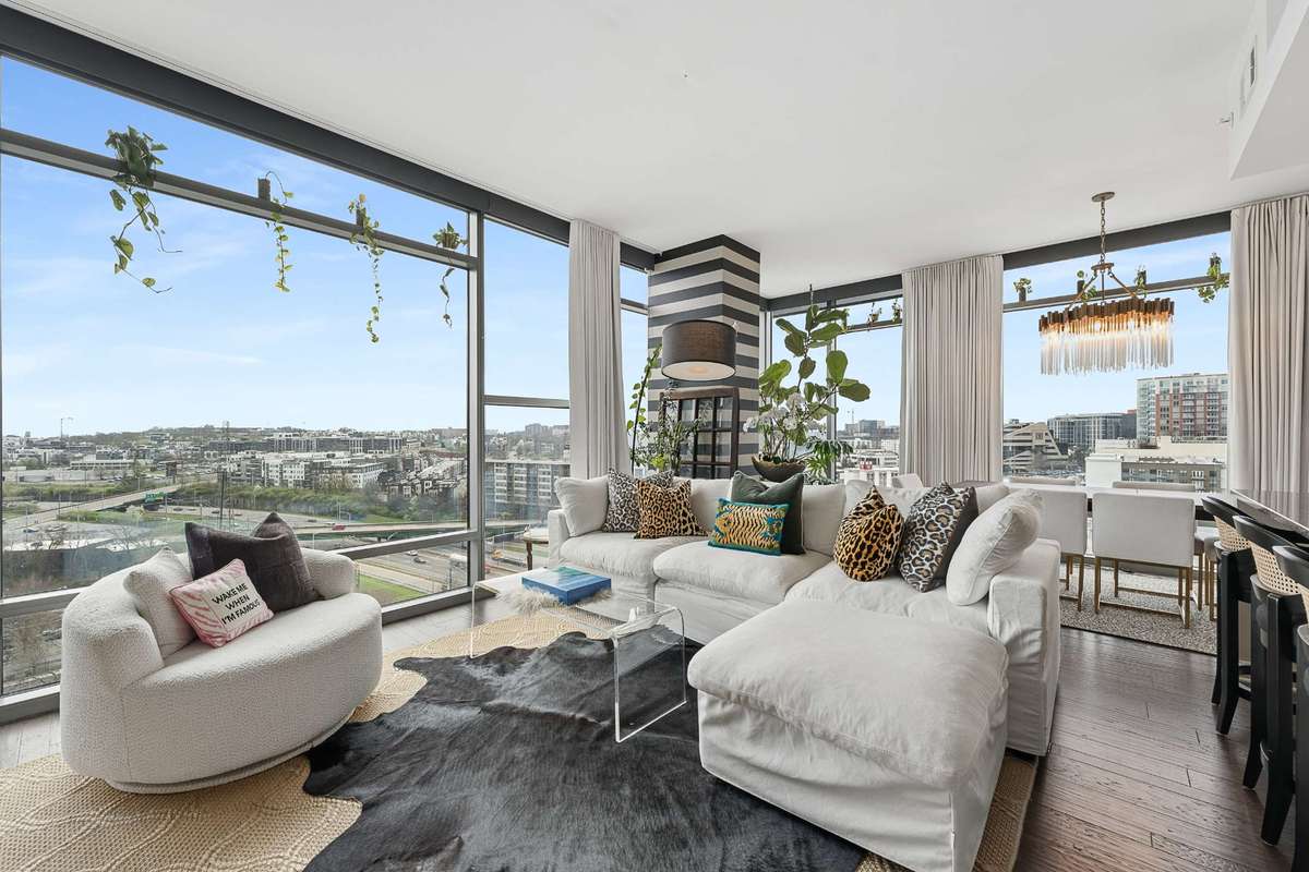 The most scenic vista and city views from this corner unit are exceptional. Custom blinds and curtains to remain. This unit has TWO premier parking spaces AND a storage unit!