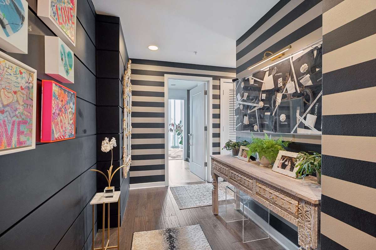Step into unit #1213 with a dedicated entry hall/foyer and prepare to be wowed!
