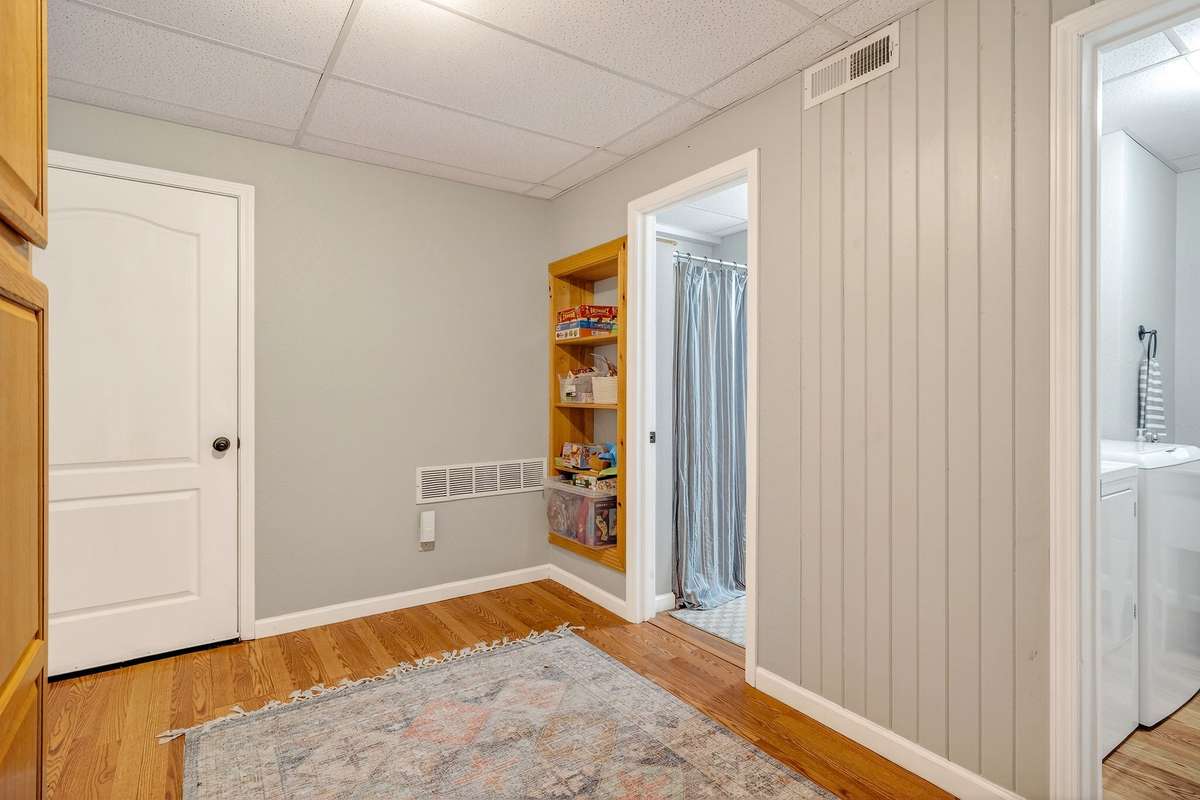 Basement level entry from garage featuring a built-in pantry for all your lake gear.