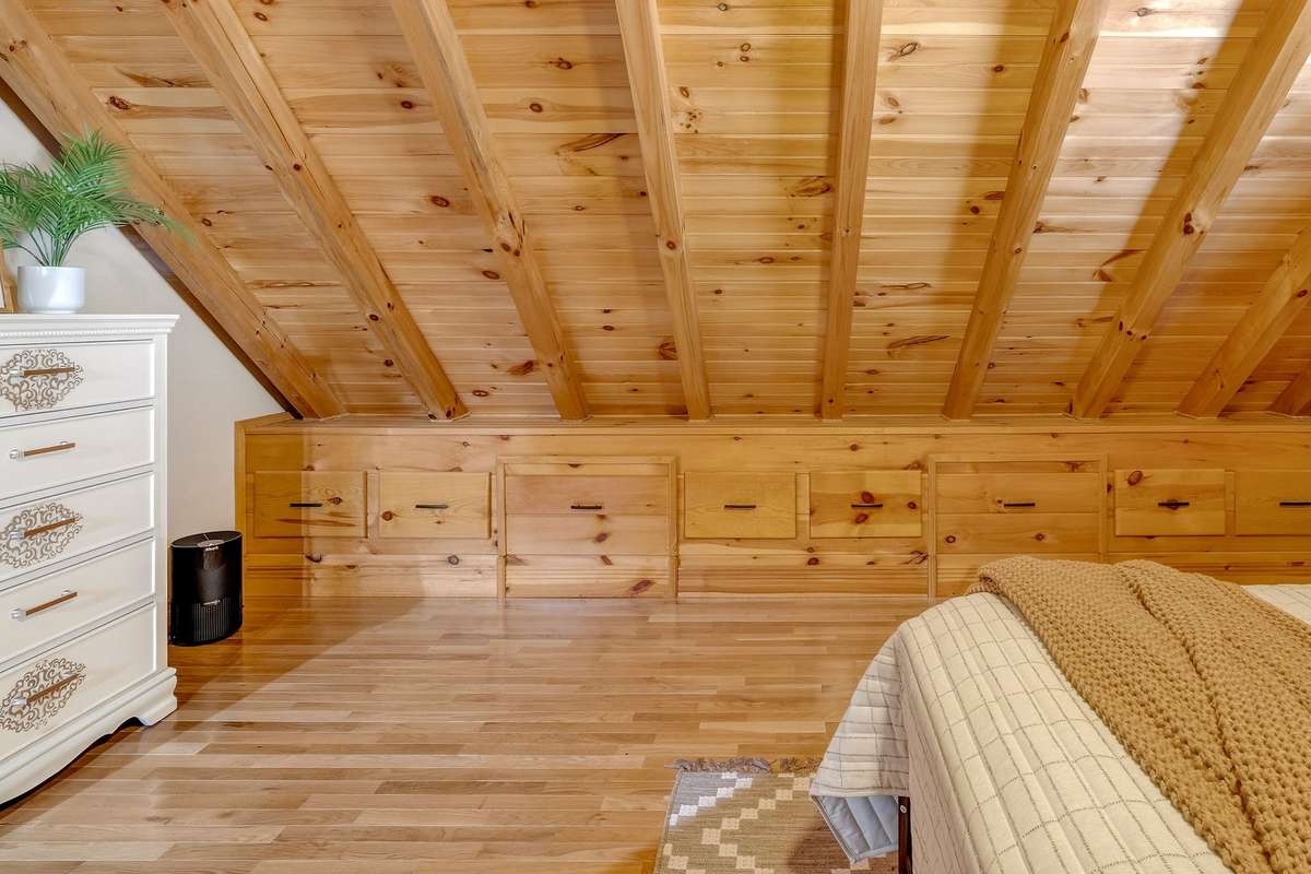 Upper Bedroom also features built in drawers.