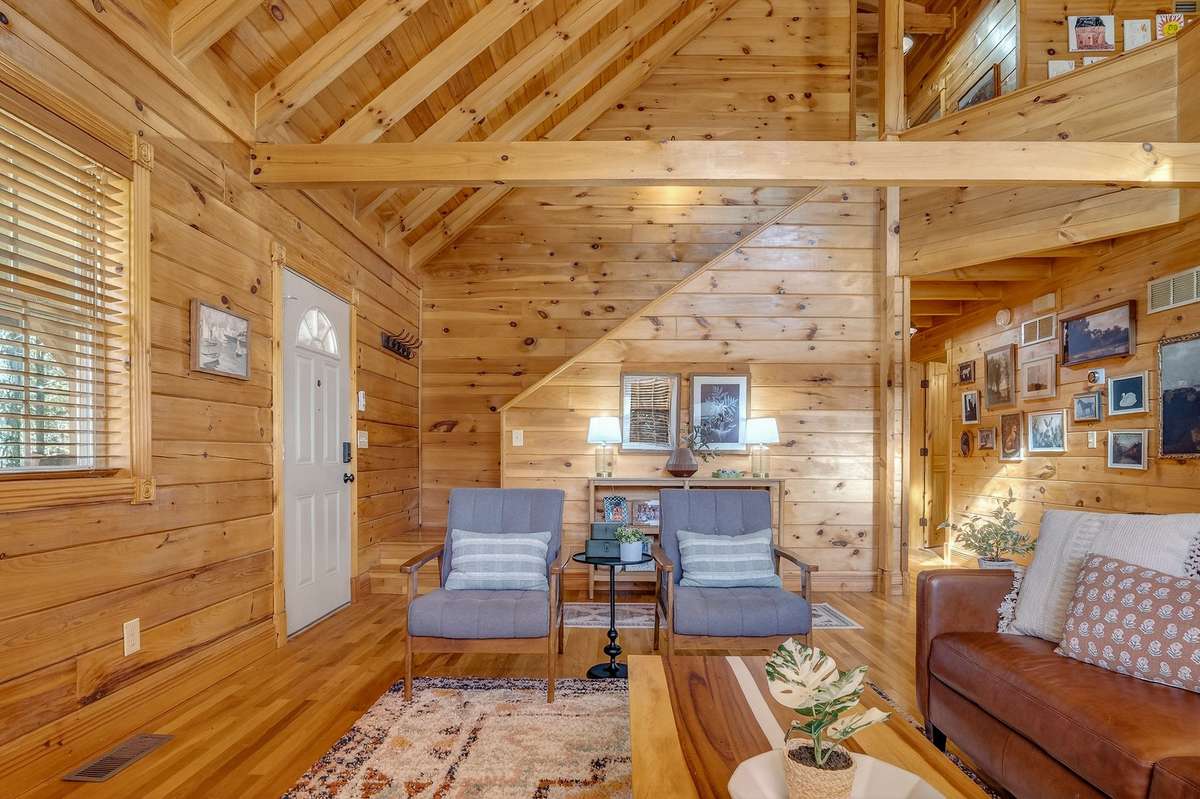 Pine walls and hardwood flooring throughout create a warm and inviting palette that is easy to care for as well.