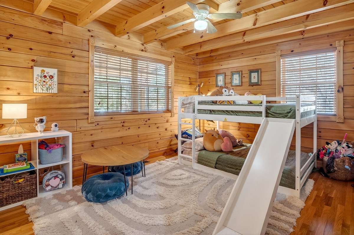 Main level bedroom has room beds for 4 children.