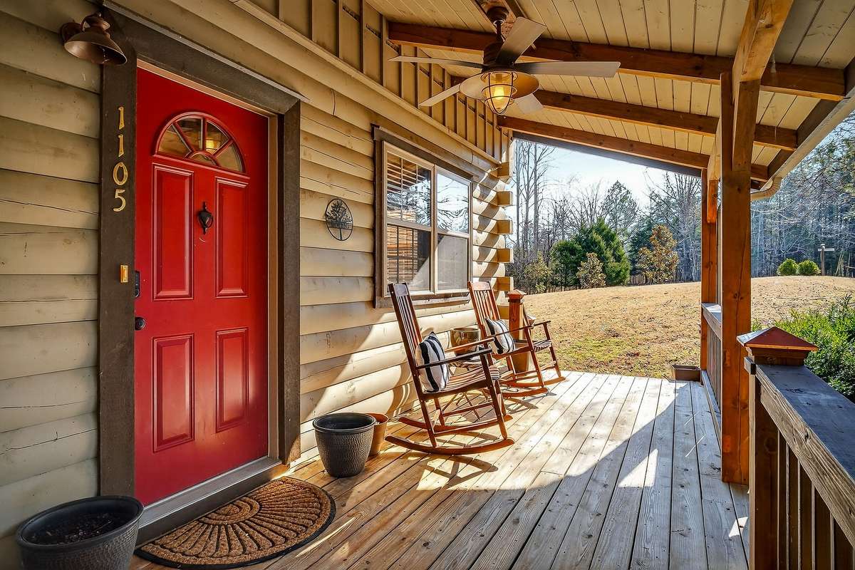 Expansive covered front porch is very inviting.