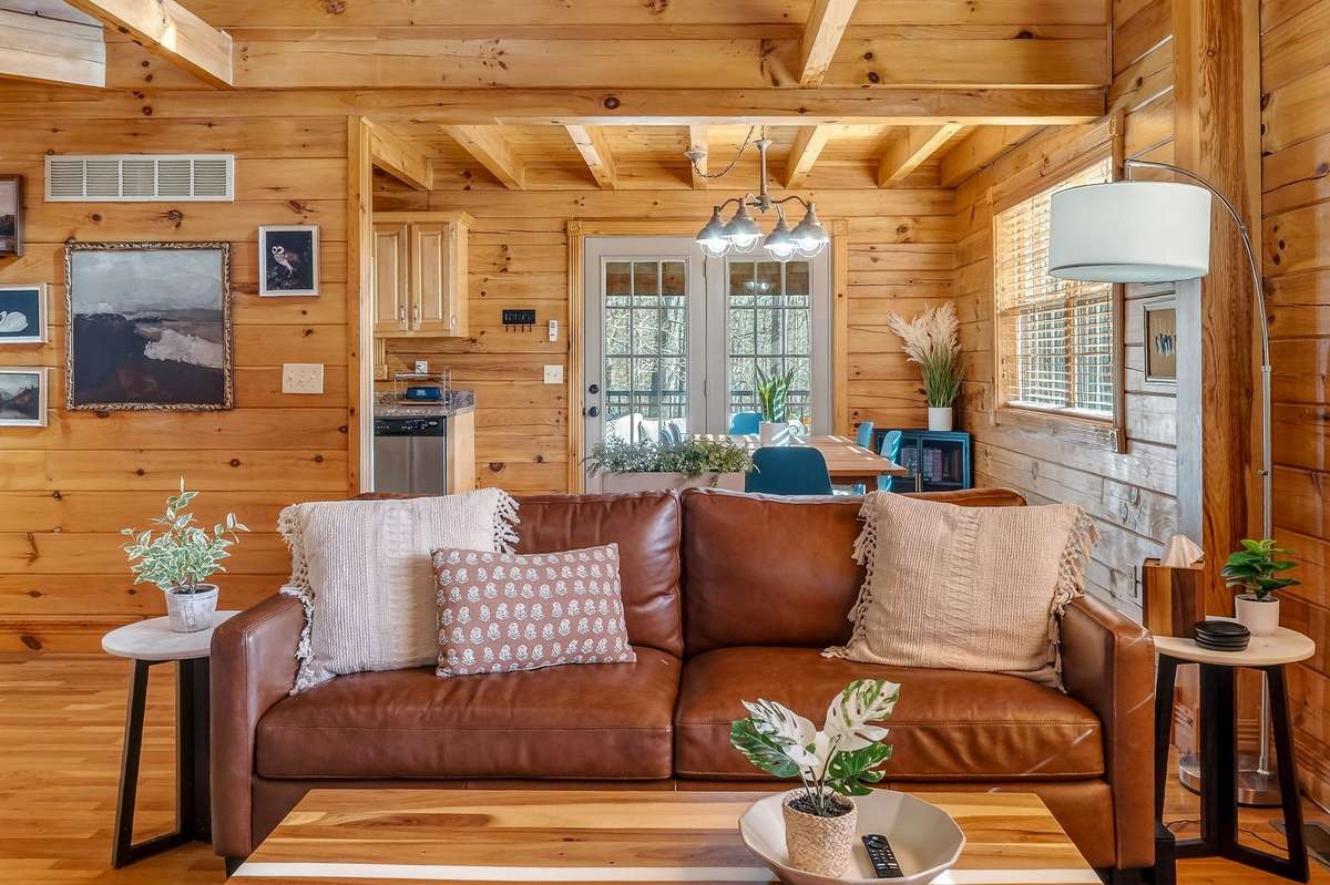 Main floor living area is open to the kitchen and eating area.