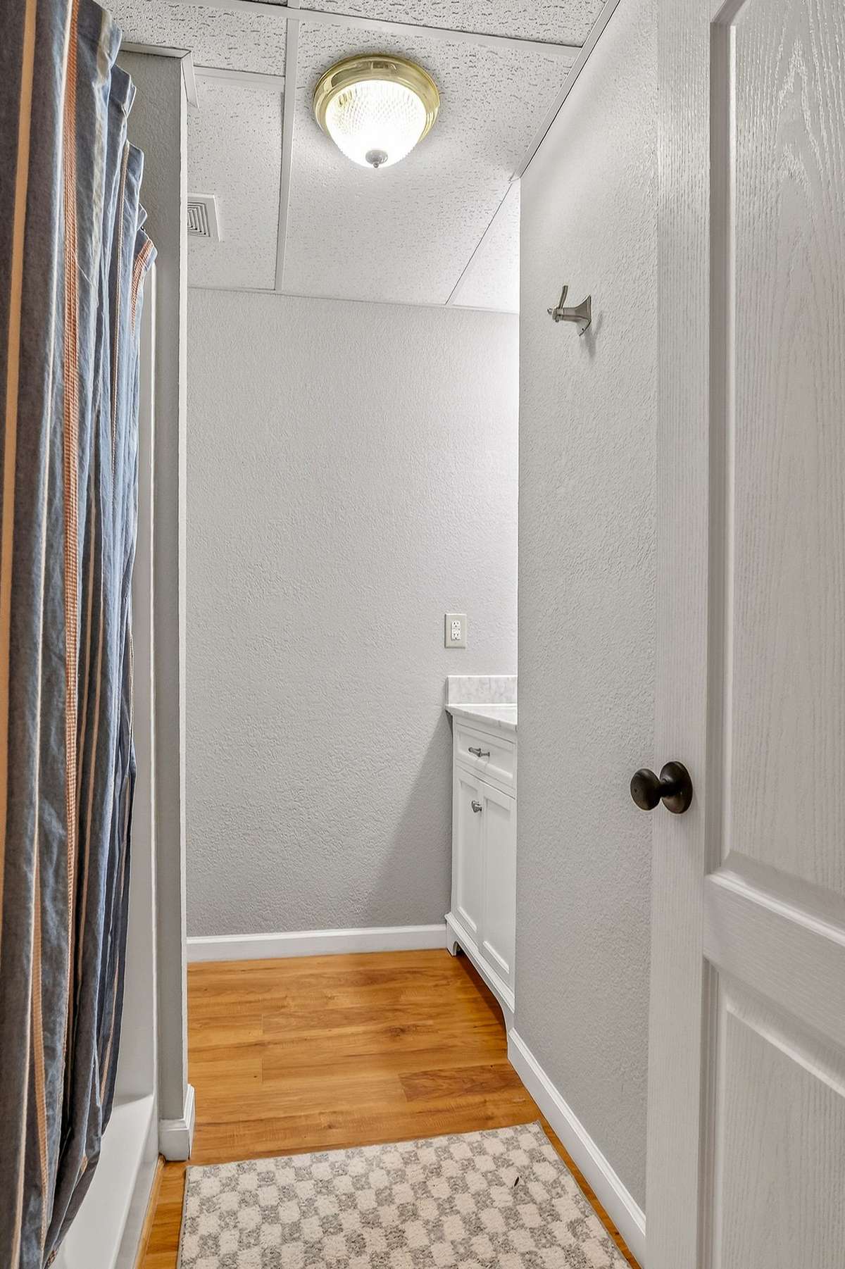 Lower-level bath has a shower.