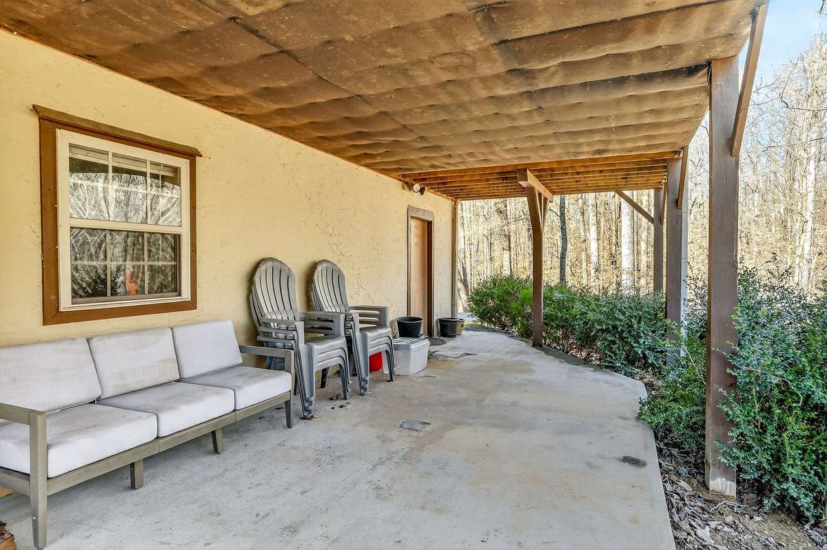 More outdoor space-covered rear patio.