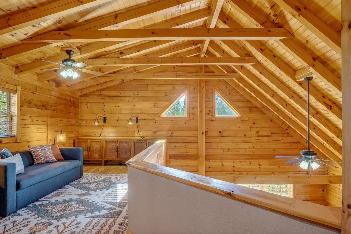 Cozy upper living space is filled with abundant natural light.