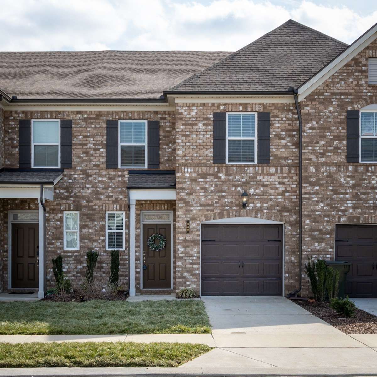 Welcome to 339 Cheval Drive — a stunning brick townhome in Gallatin featuring classic curb appeal, dark shutters, and an attached one-car garage. Walkable to dining and shopping, and move-in ready inside and out. Fresh Sod in front yard!