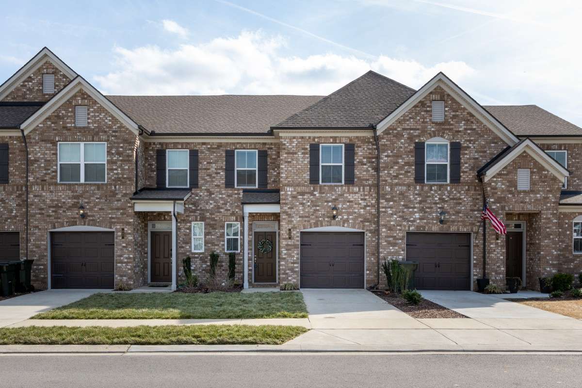 Welcome to 339 Cheval Drive — a stunning brick townhome in Gallatin featuring classic curb appeal, dark shutters, and an attached one-car garage. Walkable to dining and shopping, and move-in ready inside and out. Fresh Sod in front yard!