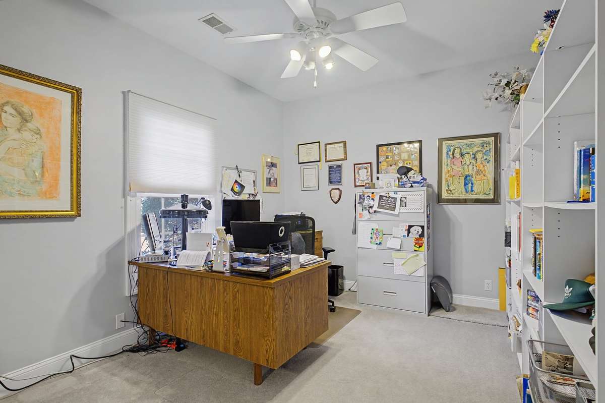 Secondary bedroom being used as an office.