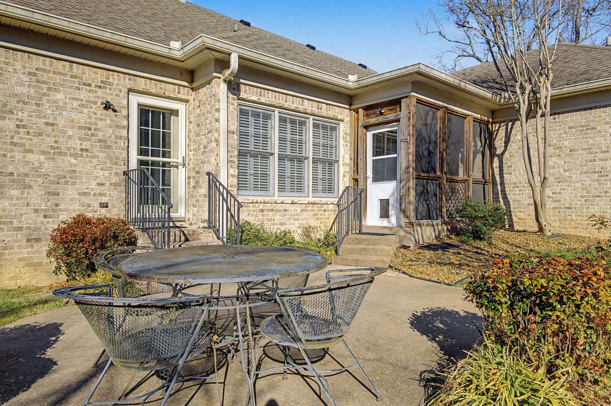 Patio and screened in porch. Furniture conveys with home.