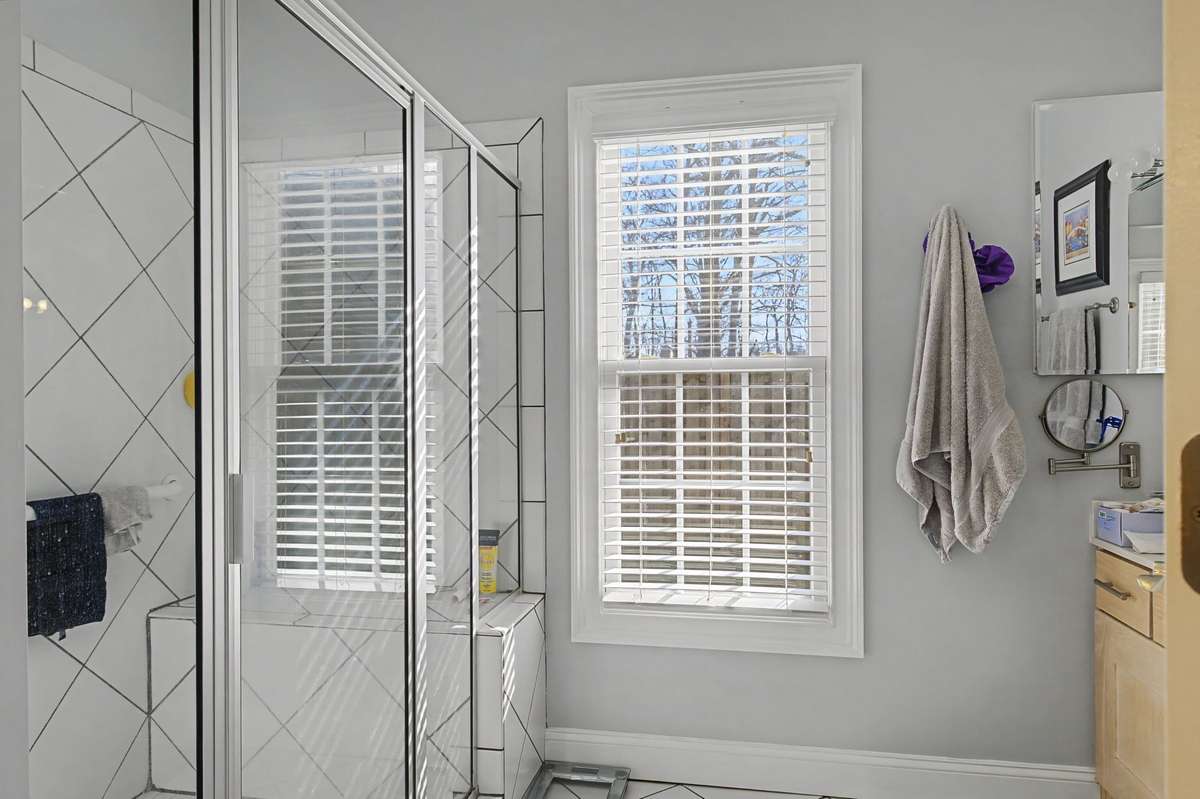 Large walk in shower and second vanity area.