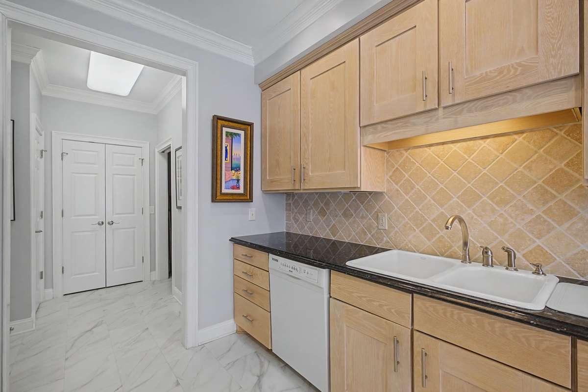There is also a large pantry and a utility closet.