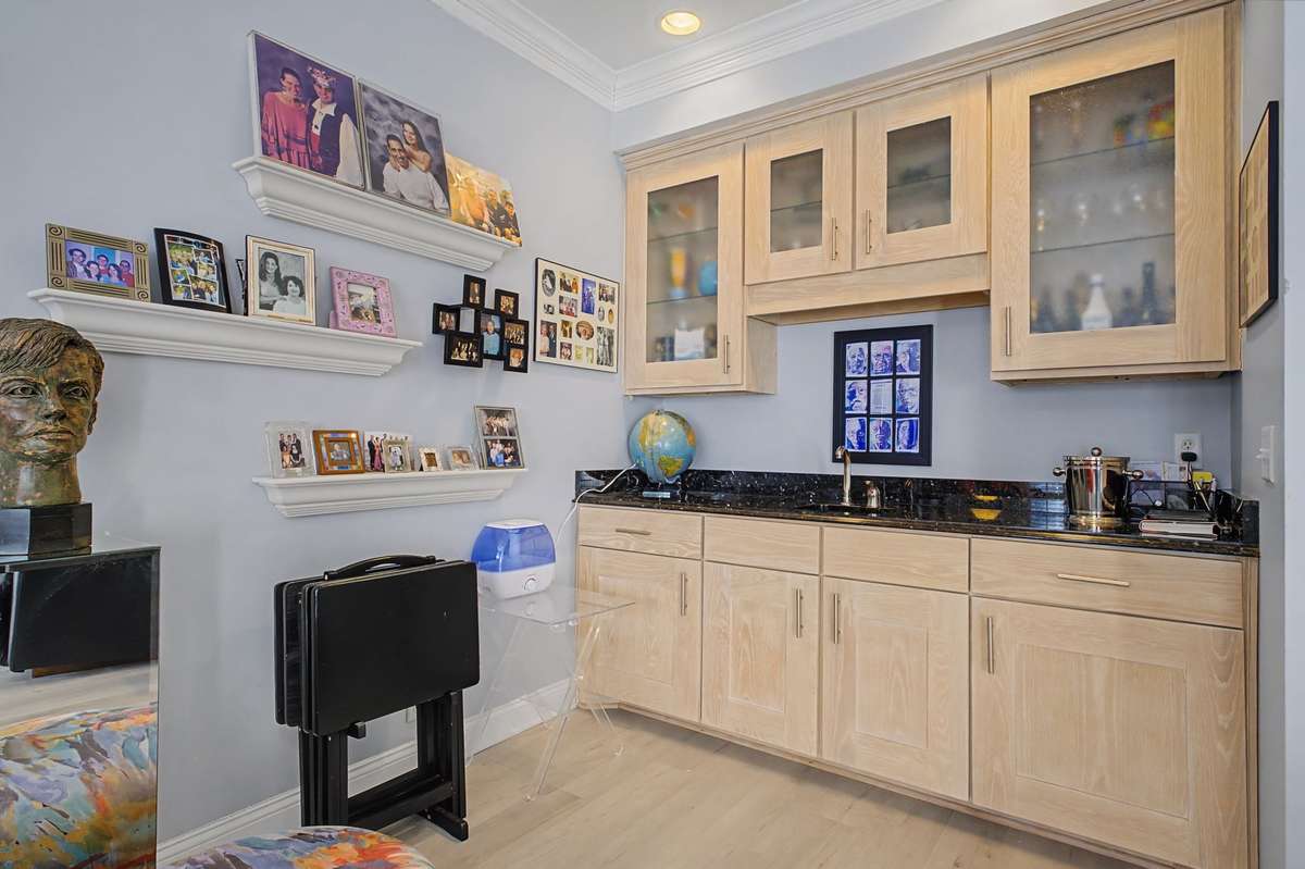 Built in wet bar and storage cabinets.