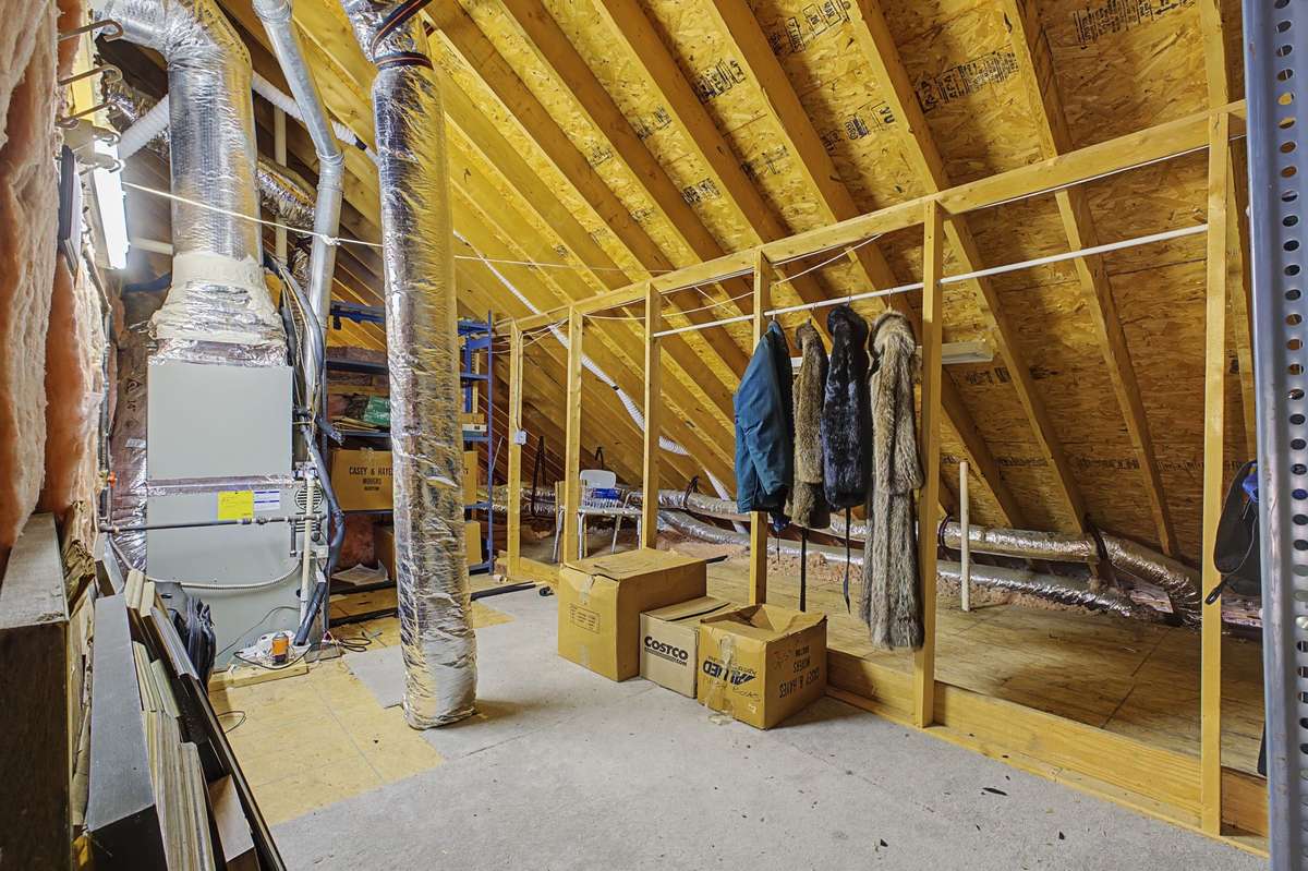 Walk in attic storage.