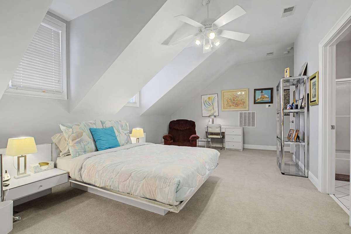 Large upstairs area with dormers and can be used as bonus room.