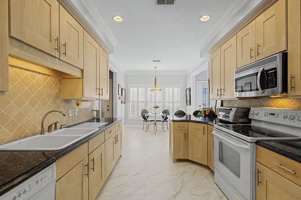Looking through kitchen to the breakfast area.