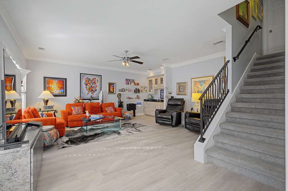 Warm and inviting den. Steps to the bonus/4th bedroom and bath.