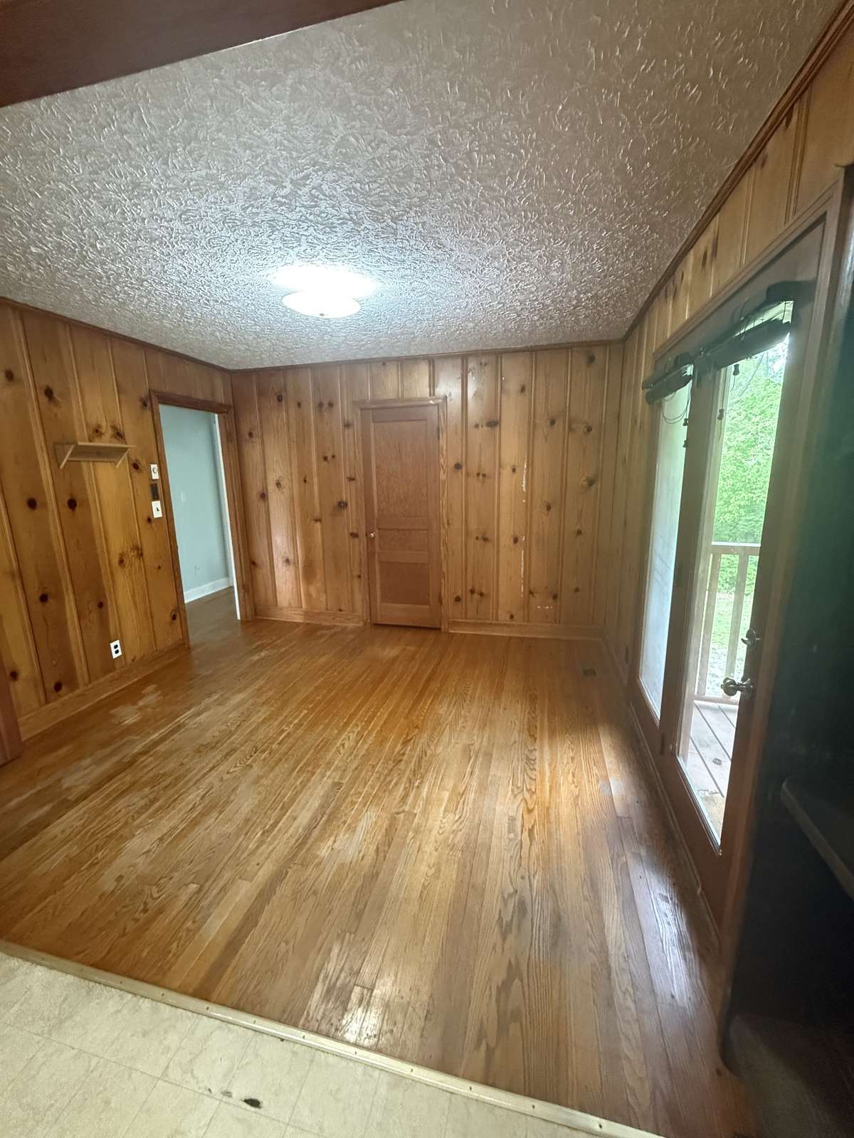 Open dining area adjacent to the kitchen that leads out to the back covered deck perfect for entertaining