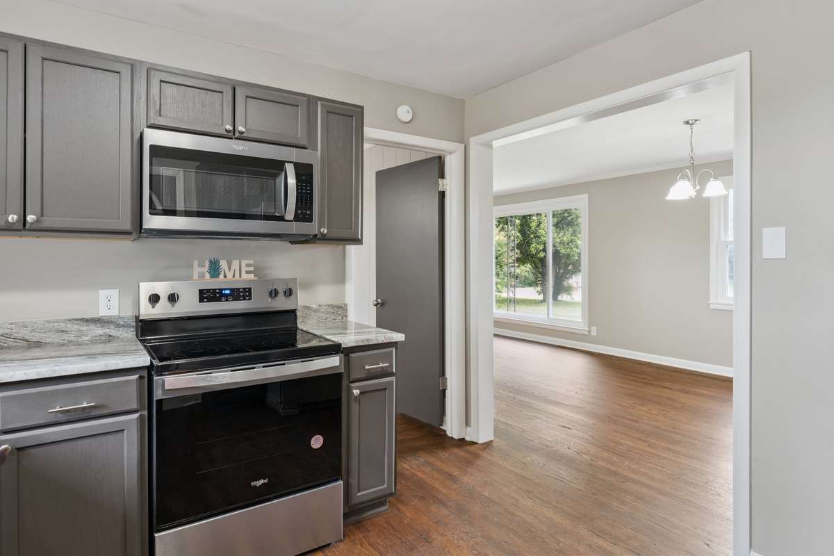 Kitchen looking into dining/living