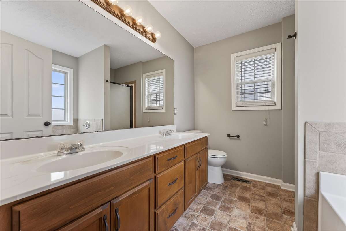 Double vanities and plenty of countertop space.