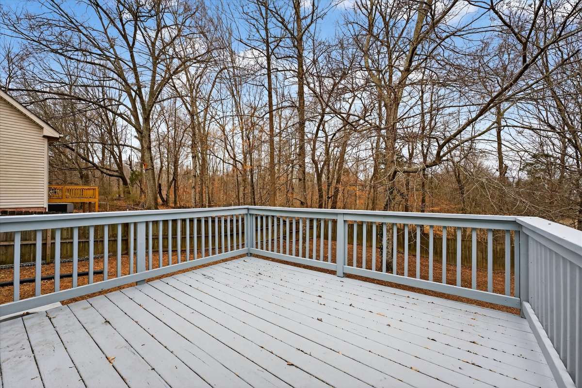 Deck overlooks NO backyard neighbors and a beautiful landscape.