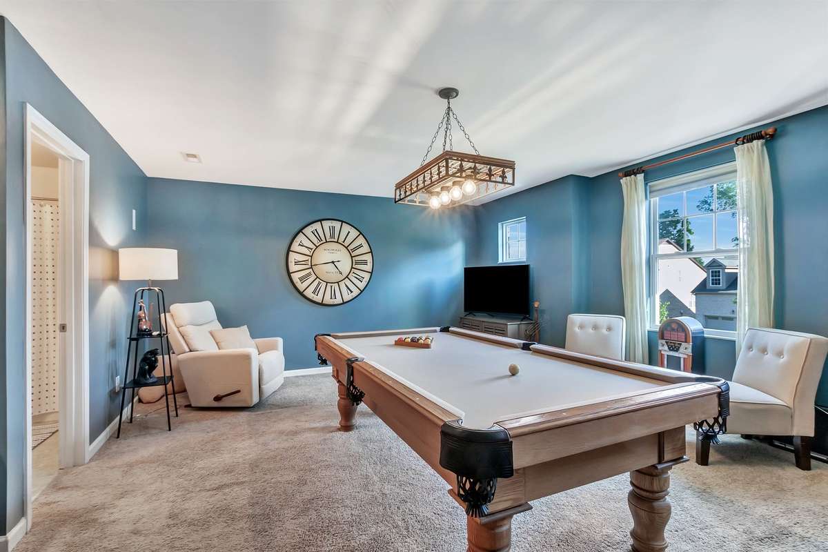 The pool table has been sold, but there were still tons of room with it.