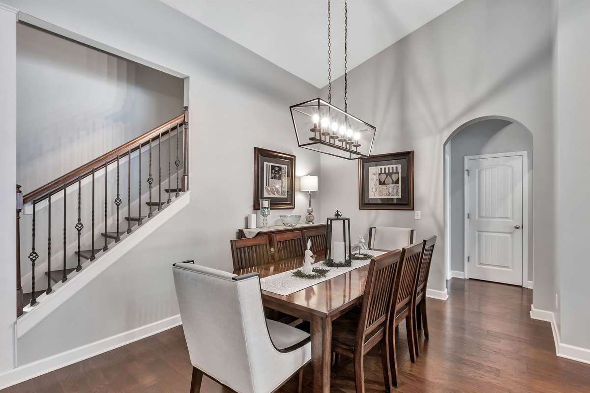The dining room is open, with easy access to the kitchen.