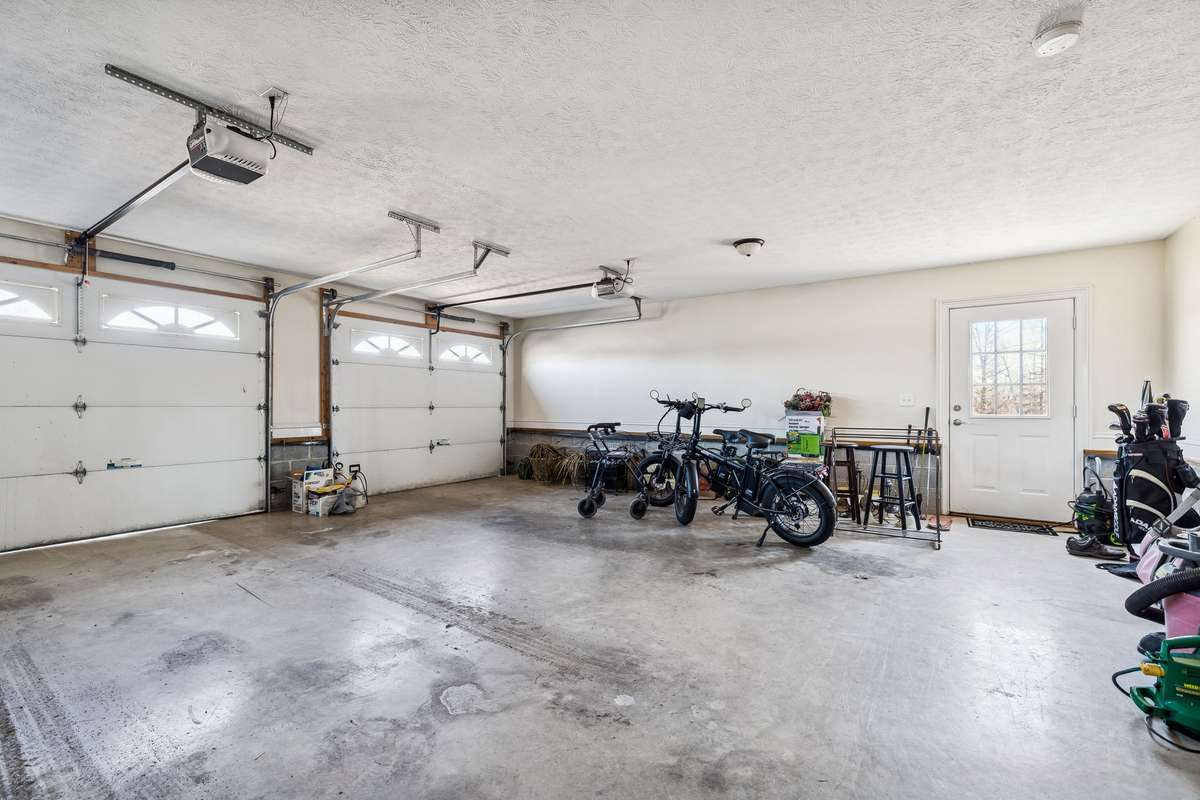 Extended two car garage with two pedestrian doors