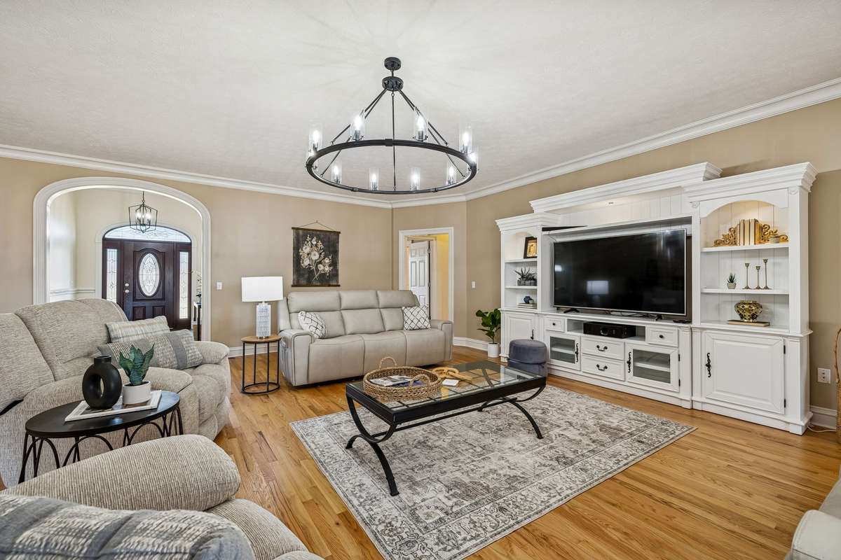 Main Living Area with refinished hardwoods, new lighting and fresh paint