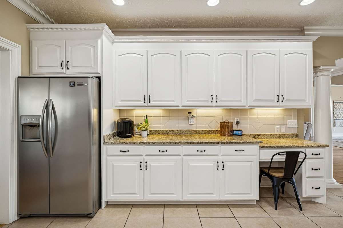 Lots of cabinet space, pull out shelves, built-in kitchen desk
