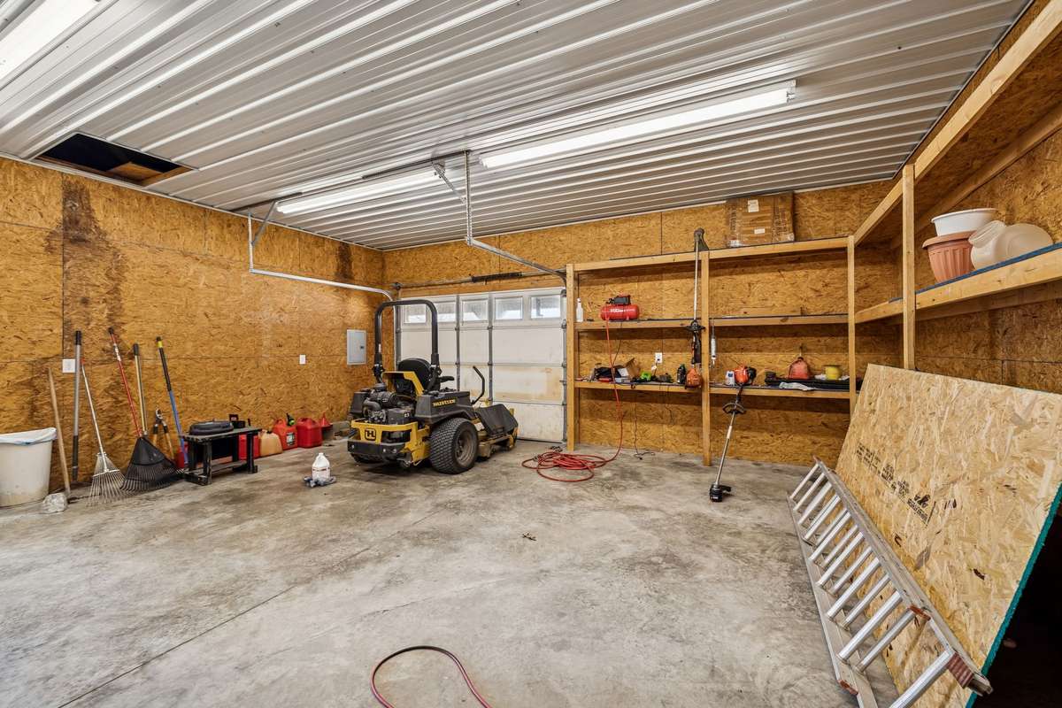 48 x 48 Metal Barn  with shelves and electrical