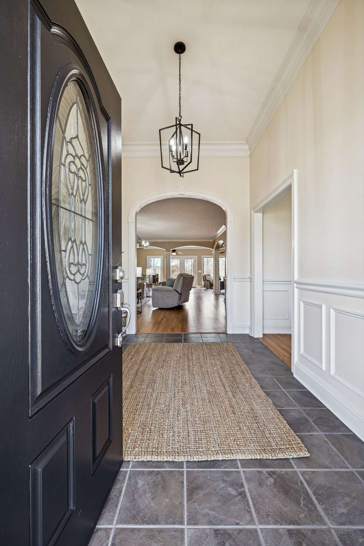 Welcome! Grand entry foyer with tile floors and new lighting