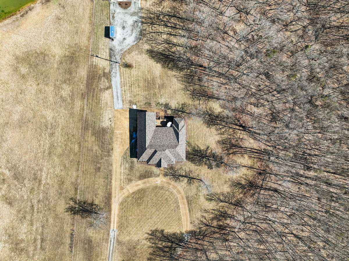 Please see the survey, the property has a long driveway and then spreads out in the back