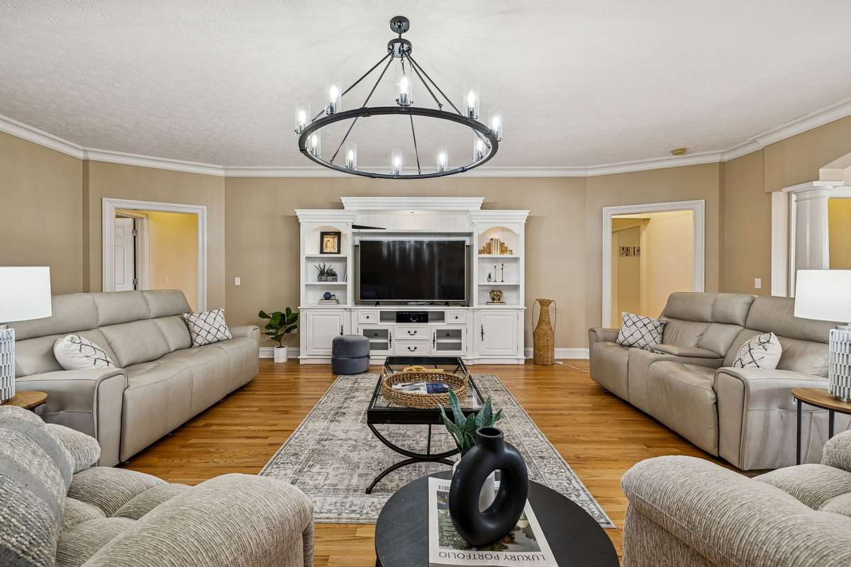Main Living Area that opens to kitchen and sunroom area. Refinished Hardwood Floors