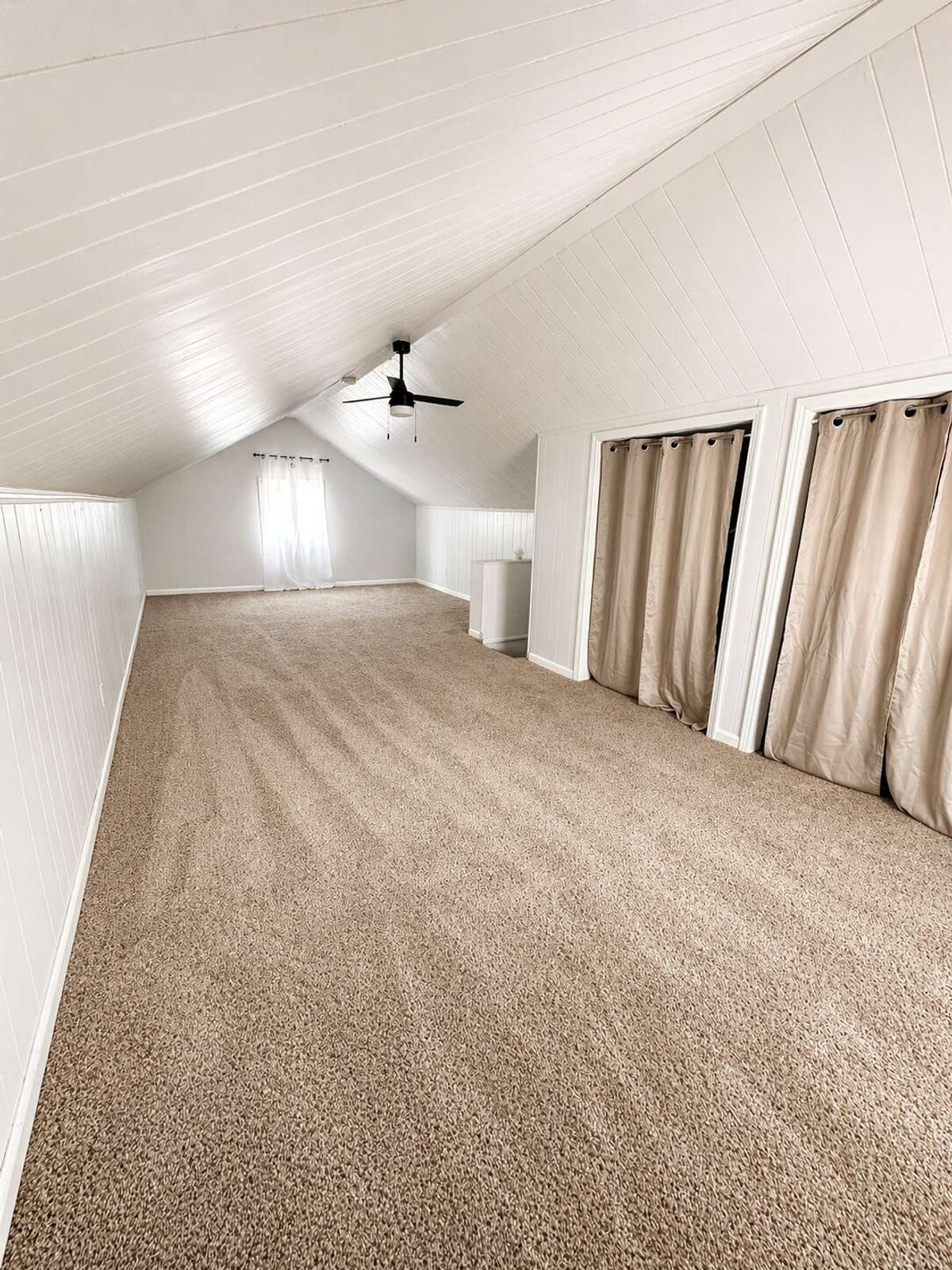 Another view of upstairs bonus/bedroom with large closet space