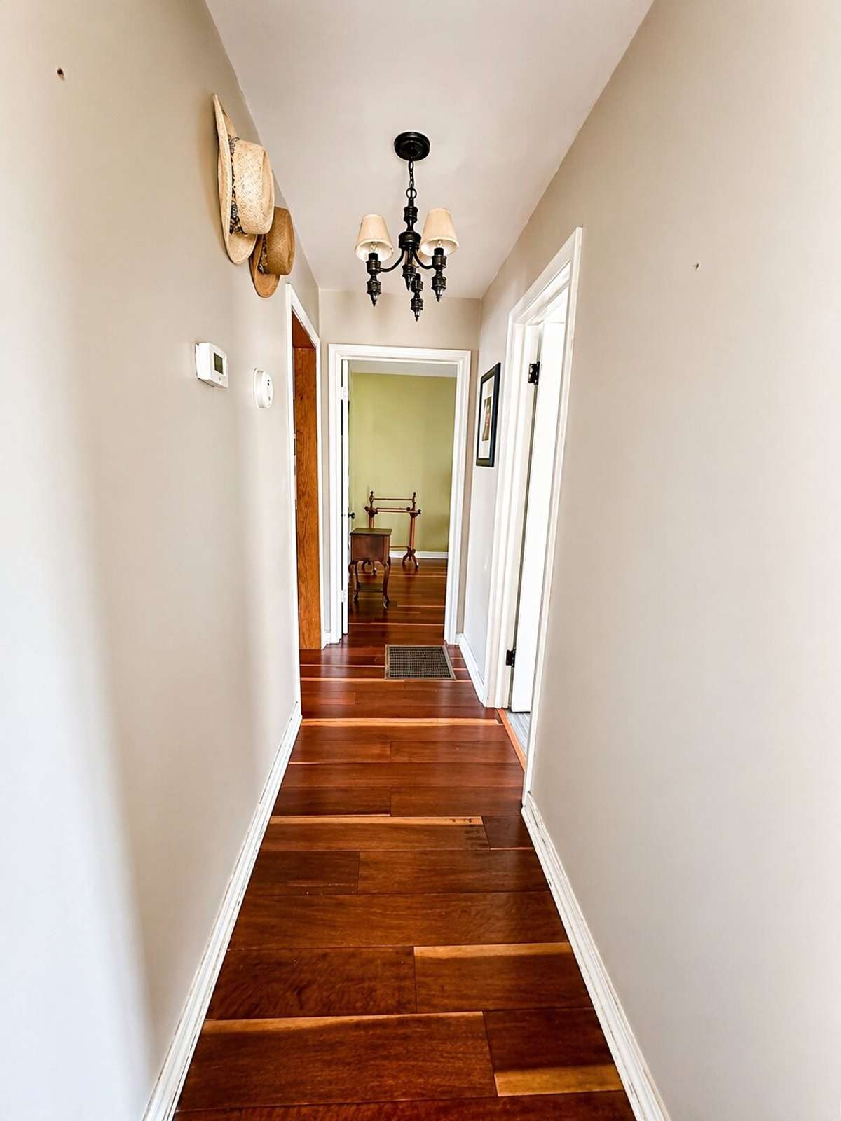 Looking down hallway from 3rd bedroom