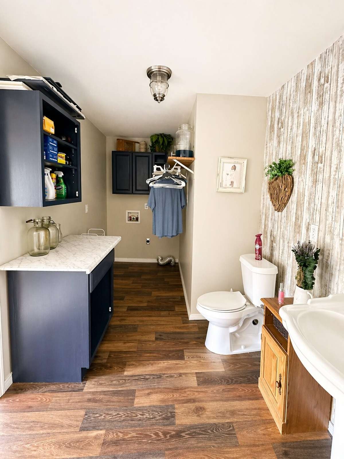 Laundry with half bath