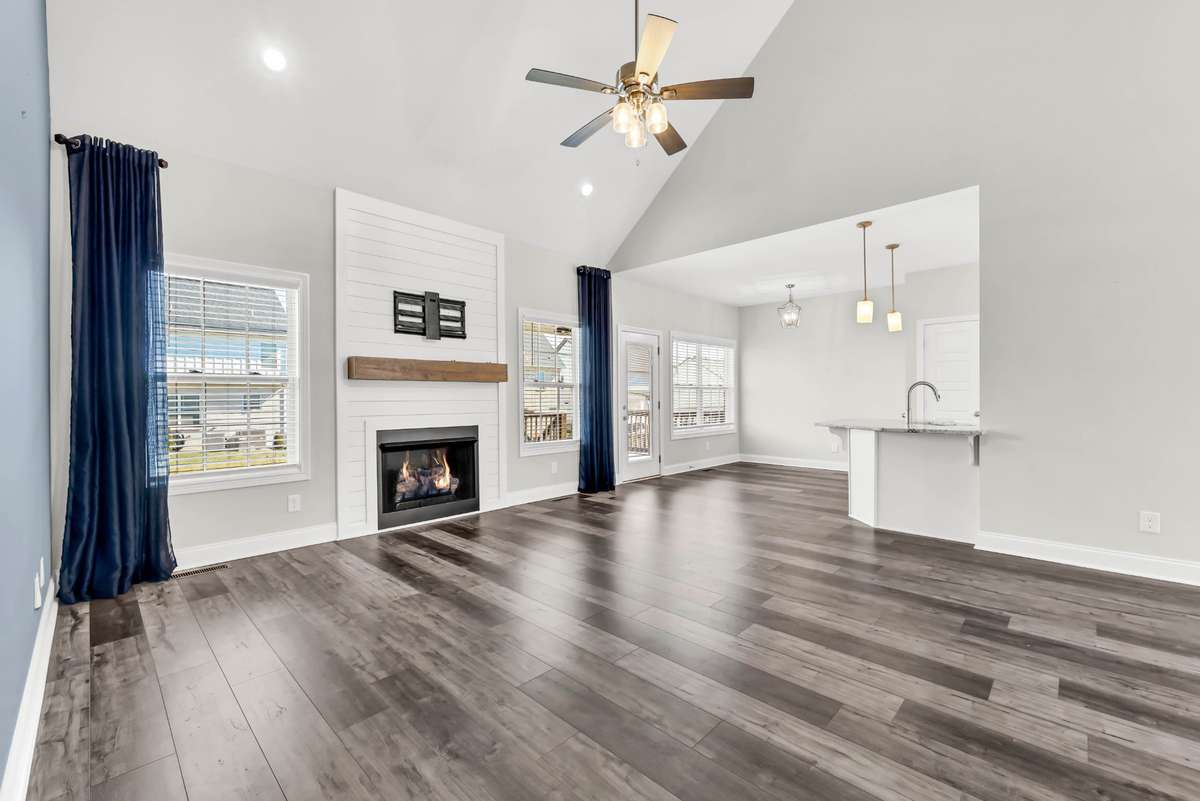 Open to the kitchen, this space allows for effortless connection between living, dining, and entertaining areas. With its modern finishes and thoughtful layout, this room is perfect for gathering with family or hosting guests in style.