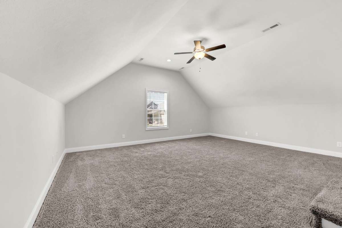 The bonus room is very spacious and could be used as a 4th bedroom!