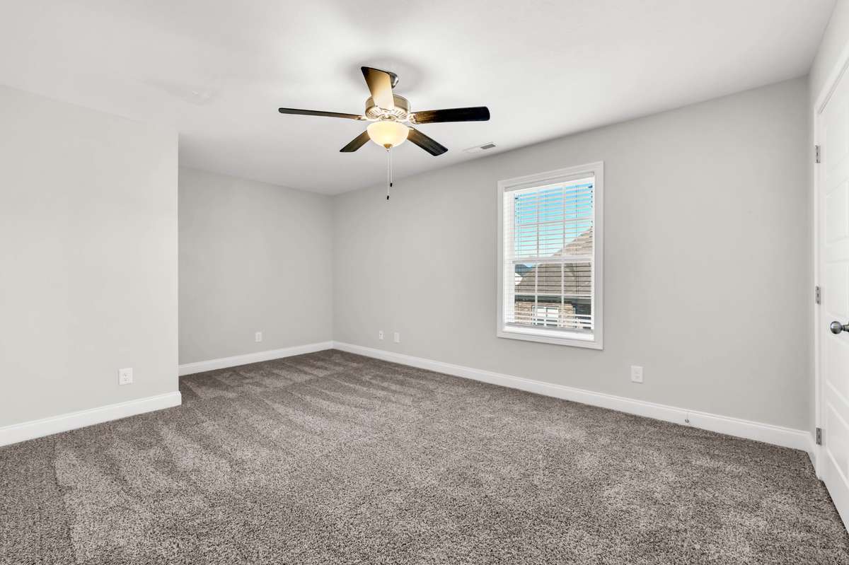 The third bedroom is upstairs and the bedrooms have great and very gently used carpet!