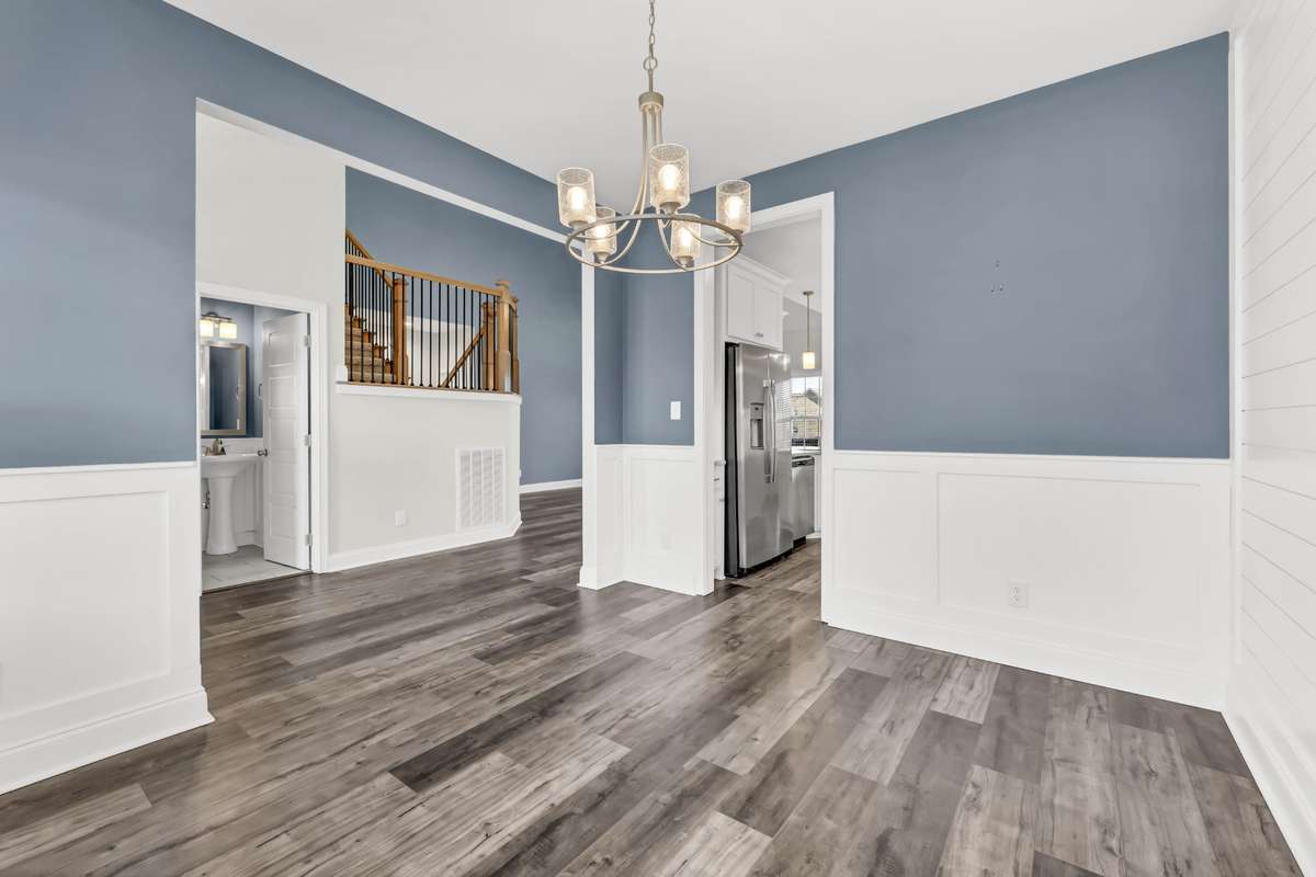 The guest will love a good meal here in this well decorated dining room!