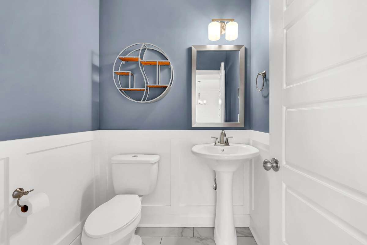 The guest bathroom also has board and batten trim!