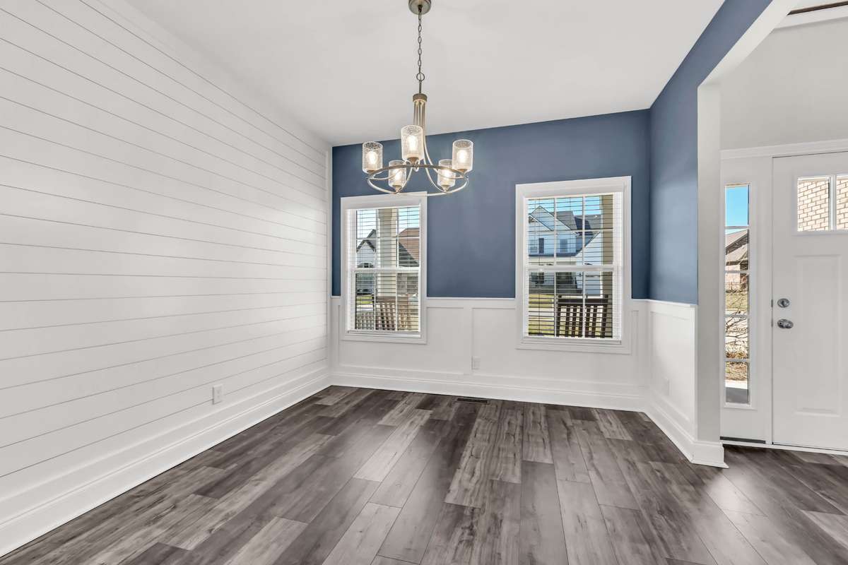 The dining room is adorned with great shiplap!