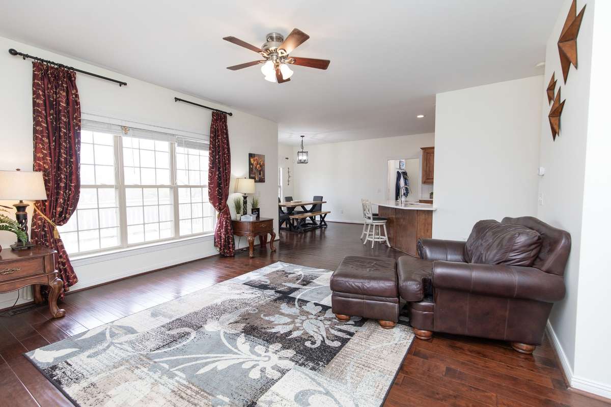 Huge living room/den with lots of natural light
