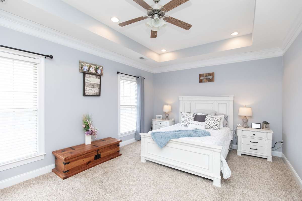 Primary suite is on main floor off large family room. Huge walk in closet with customer shelving and completely renovated bathroom. Lots of natural light too!