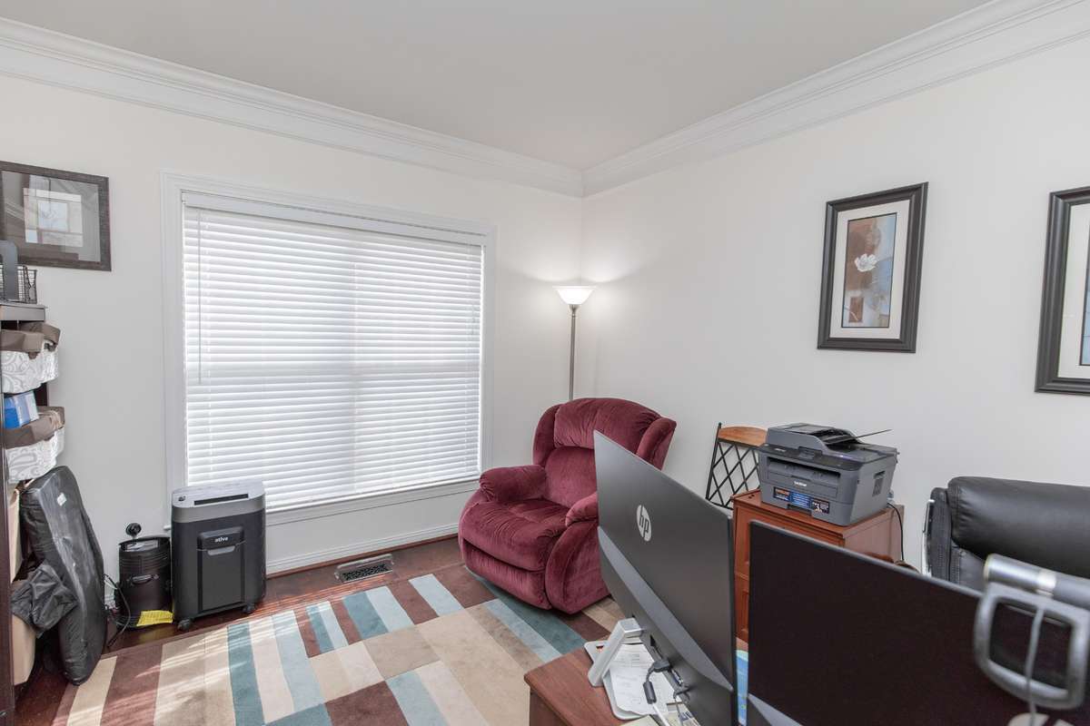 To left of front door is a flex room perfect for office space or hobby room