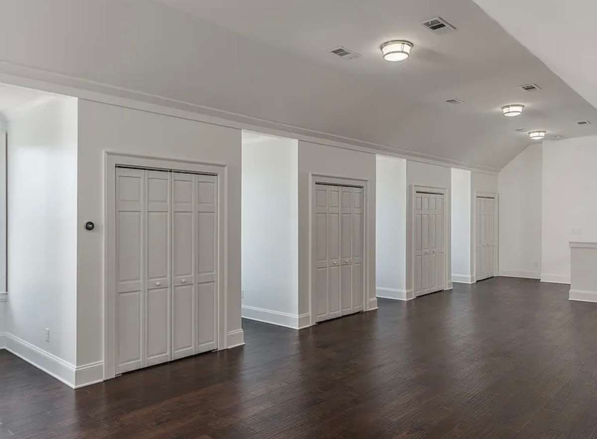 Photo of bonus room before sound booth and without podcast set (for size).