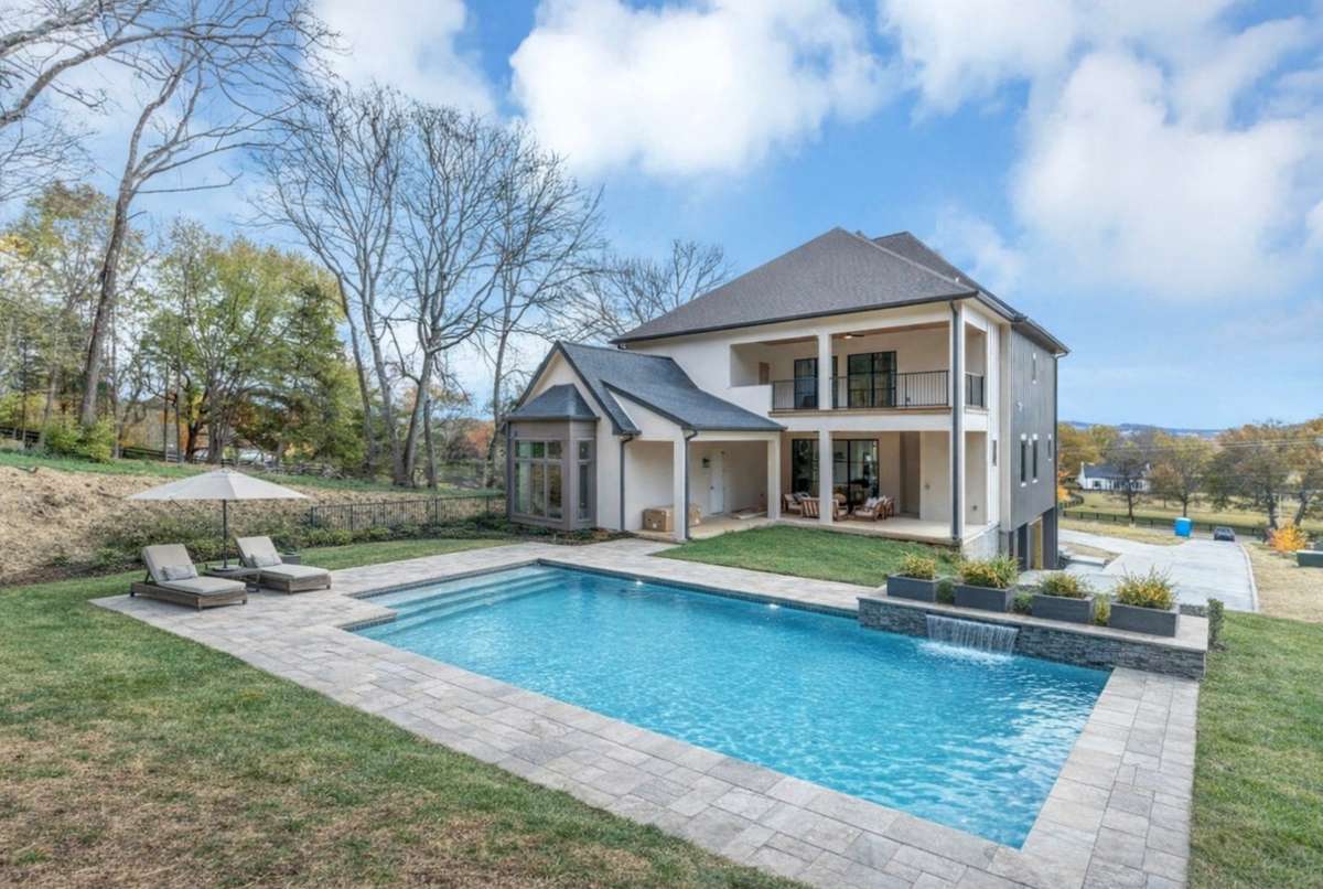 This is a rendering to show there is space in the backyard to build a pool.