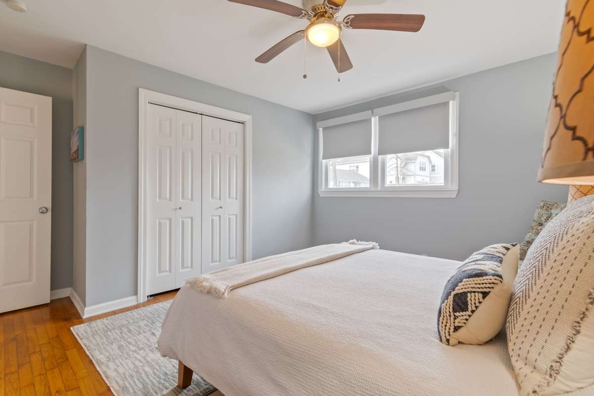 Ceiling fan and blinds.